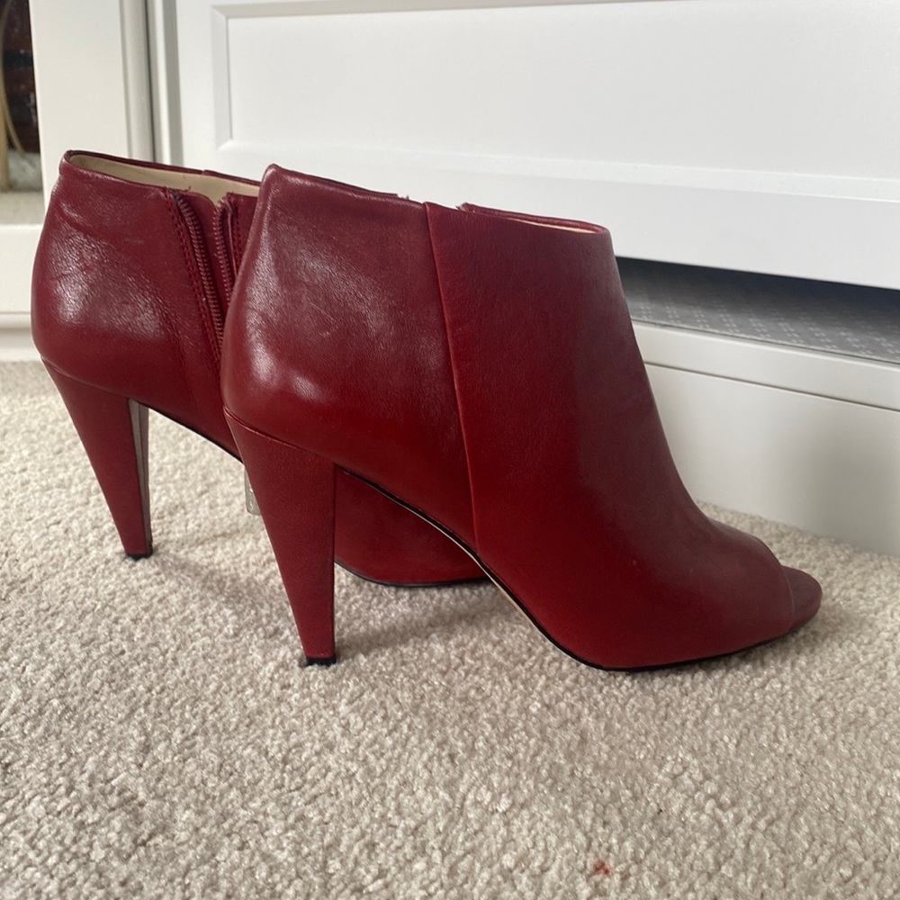 Vince Camaro open toe booties in deep red. Dive size 7 or 37 1/2.